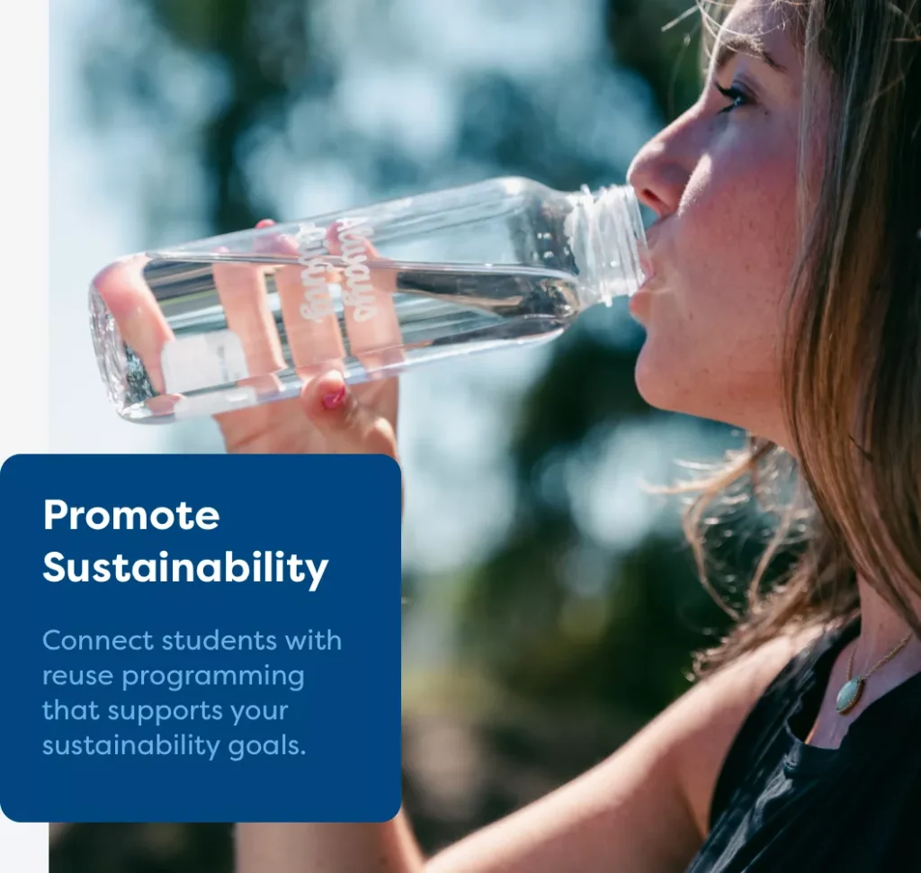 A woman drinking out of her Fill it Forward reusable water bottle outside