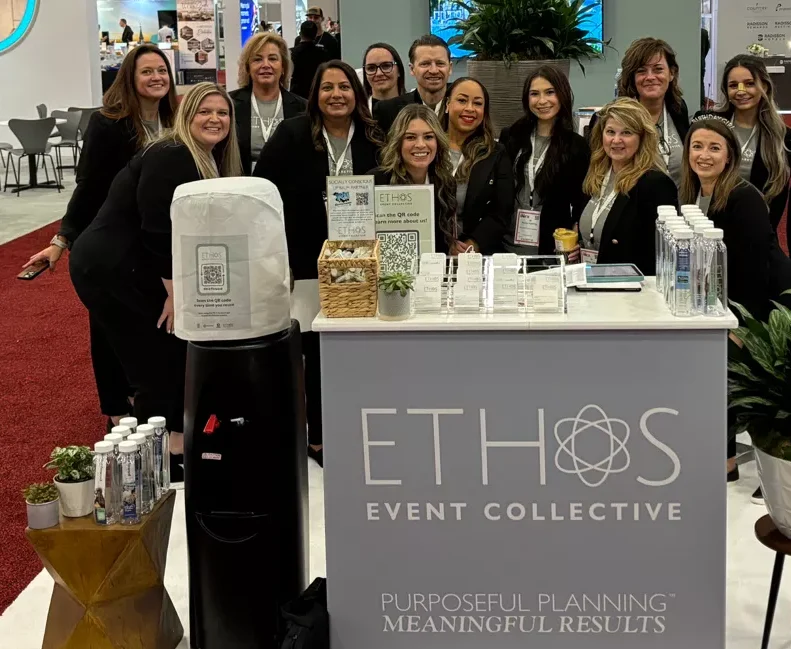 A group picture of Ethos staff at an event.